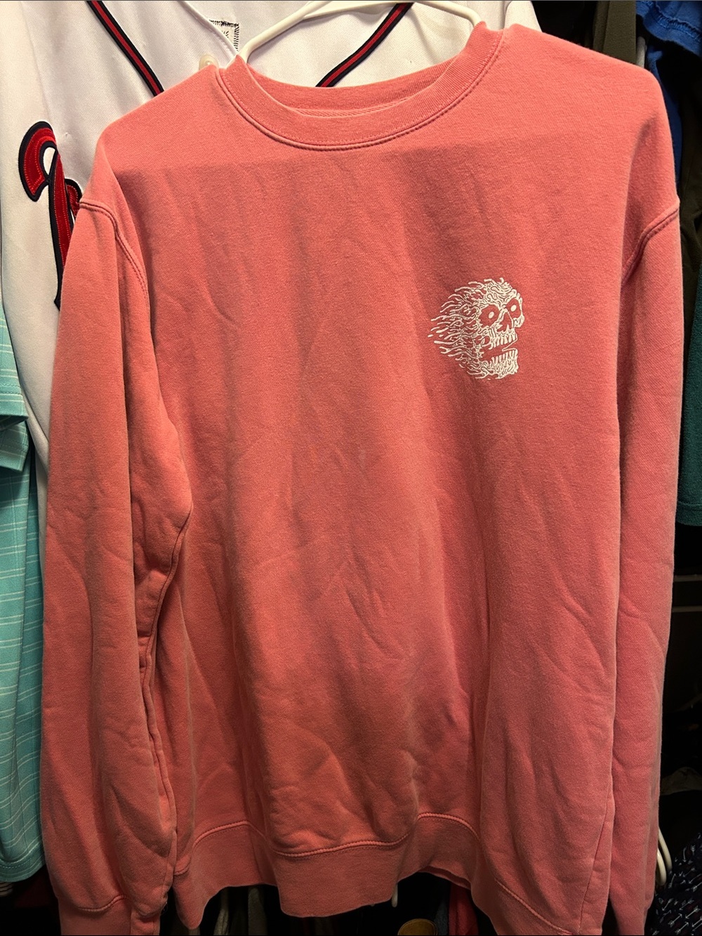 Liquid Death Coral Pink Crewneck Sweatshirt with Skull Graphic